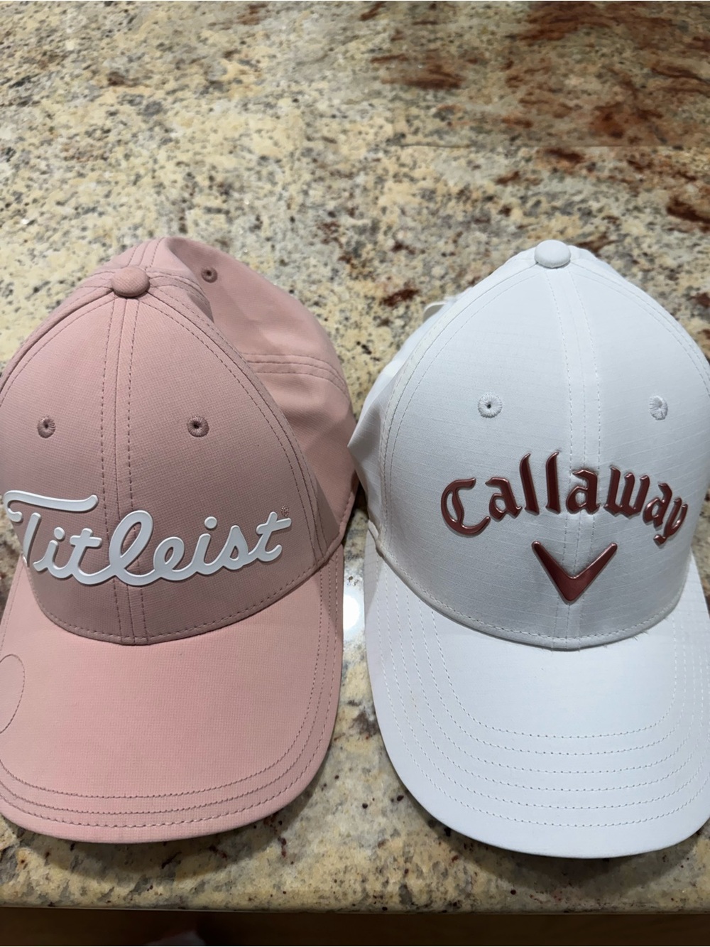 Titleist and Callaway golf hats - Pink and White